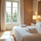 Chambre d'hôtel de luxe à Lille avec spa privé lumineux